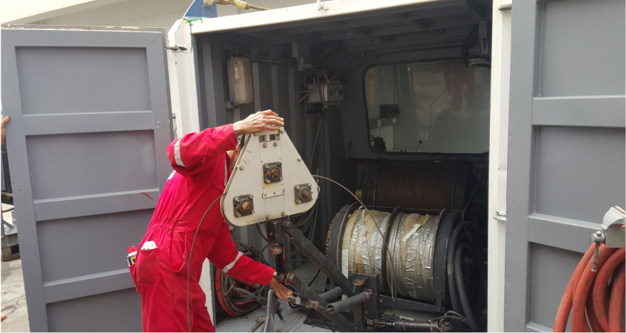 Vaughn technician working at a wireline unit
